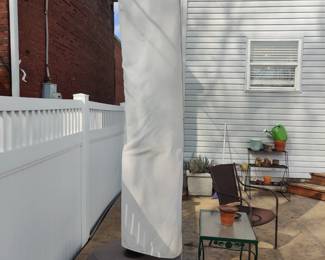Huge newer umbrella/covered with stand 