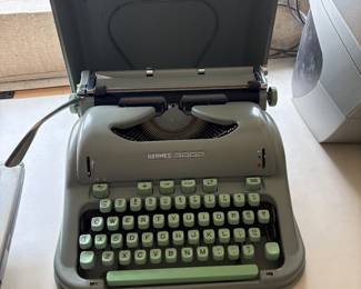 Vintage Hermes 3000 portable typewriter mint green