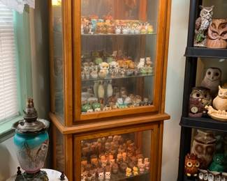 Cabinet filled with vintage owl salt and pepper shakers