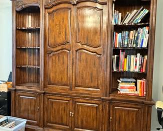 Wooden bookshelf with sliding doors