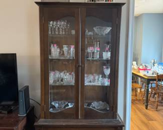 Antique glass front display with glass collection