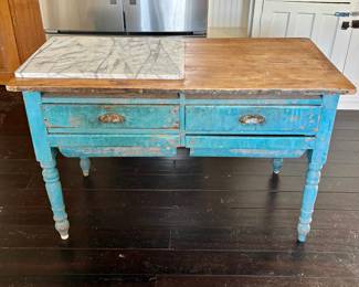 Bakers table with marble cutting board