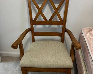 Wooden upholstered armchair