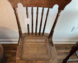 Antique cane bottom wooden chair