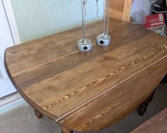 Vintage Wooden Oval Table - ends fold down. Great for smaller spaces