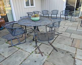 Exception quality wrought iron patio furniture likely by Salterini or Woodard. Extremely heavy!