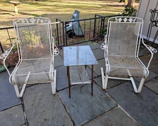 Wrought iron chairs by Russel Woodard. Side table by Ames Aires