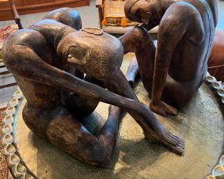 Mid Century modern wood carved figures, large round table.