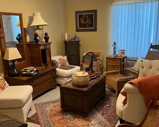 Antique dressing table, wicker chest, vintage childs rocker, loveseat, chairs, rugs.