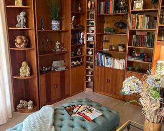 Scandinavian bookcases and wall unit, collectibles, bench, books.