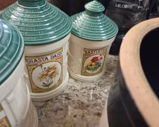 #126 Hearth and Home 'Garden Seeds' ceramic canister set 4pcs $30.00