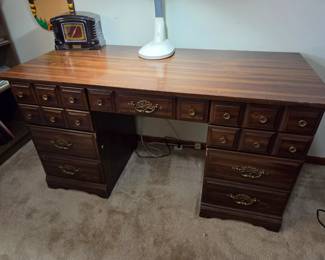#53 Laminate 5 drawer knee hole desk (as is finish) - 54x24x29 $50.00