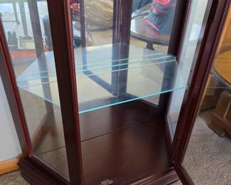 #6 Laminate Half-Moon Display Cabinet - lighted w/1 glass shelf w/plate rack etched in back of glass - 28x11x29 $65.00