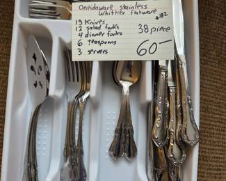 #132 Oneida stainless Whittier flatware 13 knives 12 salad forks 4 dinner forks 6 teaspoons and 3 servers with a total 38 pieces $60.00