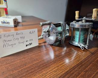 #121 2 fishing reels Ocean City 998 Pflueger Trump no. 1943 $20.00