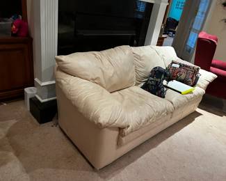 #12	sofa LR	white leather sofa with 2 cushion 82 long as is big tears on side as is side 	 $20.00 	   		
