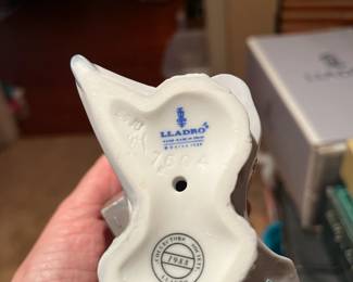 #343	Lladro	7604 Lladro 1988Girl School days  no box  	 $50.00 			
