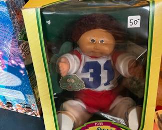 #295	Doll-br1	cabbage patch doll  1985 football uniform doll  #37	 $25.00 			
