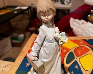 #343	Lladro	7604 Lladro 1988Girl School days  no box  	 $50.00 			
