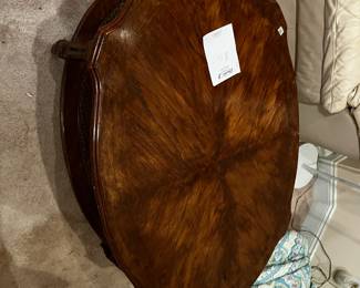 #10	table=LR	oval coffee table with wicker shelf on bottom 44x30x15 as is finish 	 $15.00 	   		

