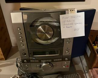 #282	office	Fisher Slim 1500 CG radio w/detachable speakers and remote 	 $45.00 			
