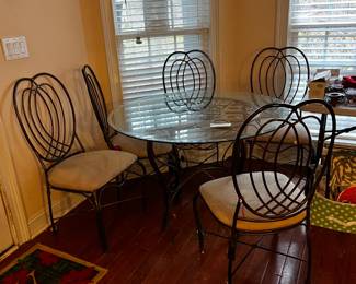 #20	round glass top metal base table with 5 metal chairs heavy 44x30	 $87.00 			
