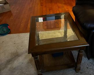#15	glass top end table with wicker shelf on bottom as is finish	 $35.00 			
