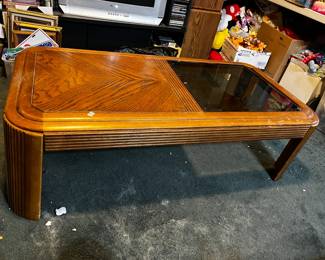 #57	table -pr	coffee table glass top insert 26x51x16 as is wobble 	 $20.00 			
