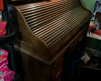#62	desk pr	Wood 2 pc Desk w/roll-top & cubbies w/9 drawers (as is condition) - upstairs 52x28x30-47 - (needs to be removed at the end - locked into the barbie room upstairs)	 $100.00 			
