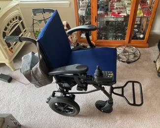 Power Wheel Chair with ramps ( not shown)