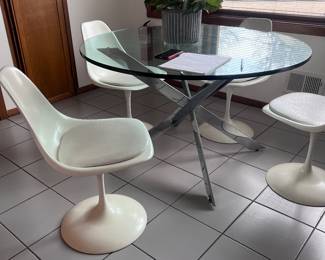 Five chairs, chrome base glass table
