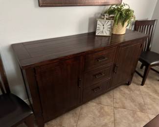 Buffet, matches dining table, purchased at Mathis Brothers, 3 storage drawers and two cupboards with 3 adjustable shelves on each side
