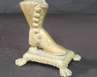 Lot # : 115 - Vintage cast iron women's boot match holder