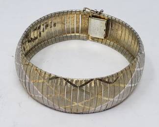 Lot # : 94 - Sterling silver bracelet w/ two tone diamond cut