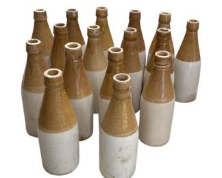 Lot # : 300z - 16 vintage stoneware ginger beer bottles