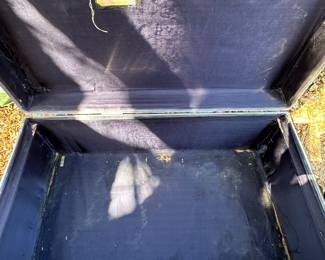 Aluminum foot locker without the top tray. 