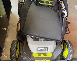 approx. 1 yr  ryobi electric lawn mower  w/ manual 