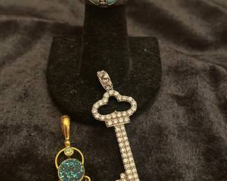 STERLING RINGS AND PENDANTS - 