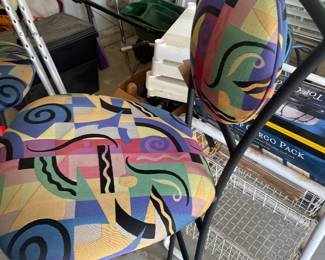one of 4 chairs  that match the rug  with the bistro table 