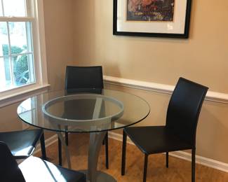 38” glass top breakfast table from La Diff in Richmond, Virginia.   Set of 4 brown chairs