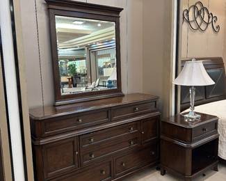 Matching dresser/mirror/nightstand/chest to queen bed.