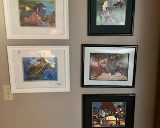 Large collection of framed Walt Disney prints