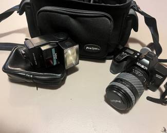 Minolta camera with case and flash