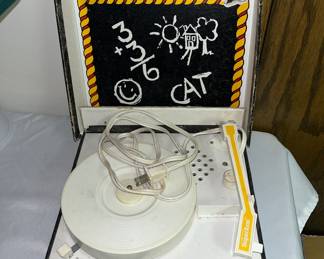 Child, record player, lid is off