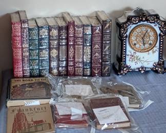 Porcelain clock 
Those Easton Press leather bound books
