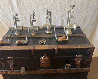 Four Old Meat, Grinders, And An Old Trunk
