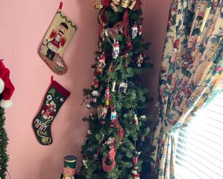 Decorated Nutcracker Christmas Tree and Lots of Stockings