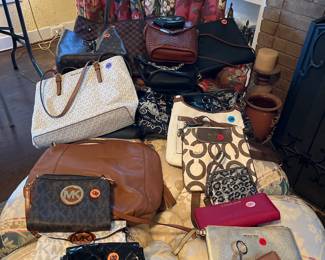 Michael Kors, Coach, Brighton, MGM, Lewis Vuitton and Channel