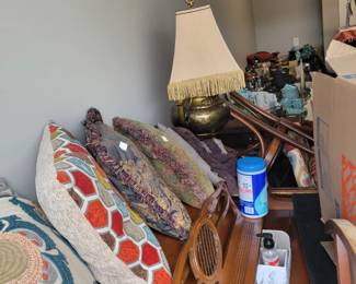 Oh my we have another piano. 
And at least 30 bed comforters and pillows galore