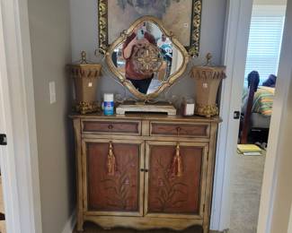 Pretty small side board or entry piece or cute TV stand or hall table or sofa table. Uses are endless for this pretty piece of furniture